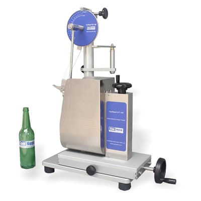 CanNeed GIT-100 glass bottle impact tester measuring pendulum drop on a 60–130 mm bottle