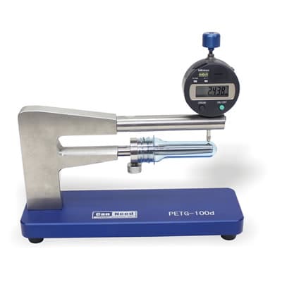 CanNeed-PETG-100D/200 PET bottle preform thickness gauge with analog dial indicator measuring a preform wall