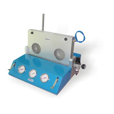 CanNeed ELT 100 leak tester inspecting rivet and tab scores on a metal can end