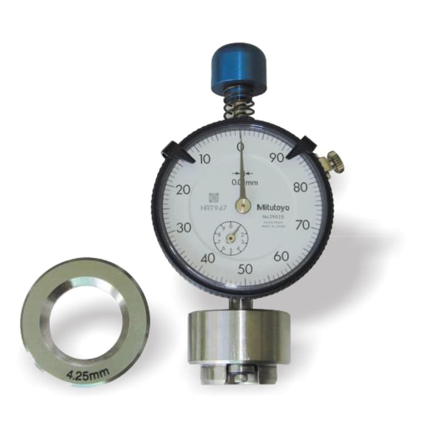 ACH-100 aerosol curl height gauge measuring tool on a laboratory bench